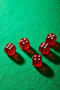 Close-up of wintoto French roulette betting chips and dealer hand during spin